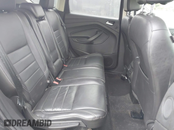 2016 Ford Escape Titanium with VIN 1FMCU0J91GUC69895, listed as a IAAI auction lot 41488171 with 162,232 mi miles. Bid and sale history available at carsss.com. Image 8.