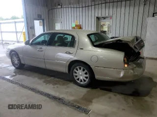 2007 Lincoln Town Car Signature Limited z VIN 1LNHM82V17Y601164, wystawiony jako Copart lot #58026565 z przebiegiem 76 486 mil mil oraz Szkoda całkowita • Salvage title. Historia ofert i sprzedaży dostępna na DreamBid. Obrazek 2.