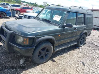 2003 Land Rover Discovery z VIN SALTY164X3A799072, wystawiony jako IAAI lot #42371522 z przebiegiem 106 157 mil mil oraz . Historia ofert i sprzedaży dostępna na DreamBid. Obrazek 2.