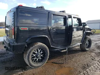 2005 Hummer H2 SUV with VIN 5GRGN23U35H111403, listed as a Copart auction lot 84720994 with 142,159 mi miles and Salvage Title. Bid and sale history available at carsss.com. Image 3.