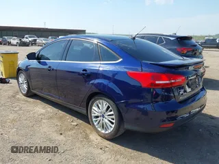 2017 Ford Focus Titanium with VIN 1FADP3J29HL204892, listed as a IAAI auction lot 42032705 with 119,028 mi miles and . Bid and sale history available at DreamBid. Image 3.