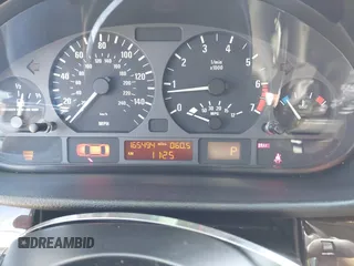 2003 BMW 3 Series 325i with VIN WBAAZ33443PH32847, listed as a IAAI auction lot 41754298 with 165,494 mi miles. Bid and sale history available at carsss.com. Image 7.