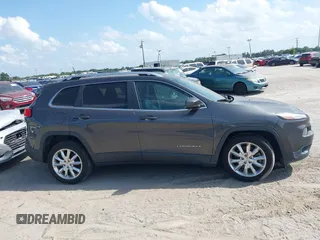 2016 Jeep Cherokee High Altitude with VIN 1C4PJLDB8GW211947, listed as a IAAI auction lot 42142282 with 158,430 mi miles. Bid and sale history available at carsss.com. Image 13.
