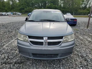 2009 Dodge Journey SXT with VIN 3D4GG57V59T582639, listed as a Copart auction lot 54008275 with 185,017 mi miles and Clean Title. Bid and sale history available at carsss.com. Image 5.