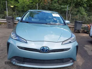 2019 Toyota Prius L Eco z VIN JTDKARFU8K3095669, wystawiony jako IAAI lot #42334160 z przebiegiem 59 882 mil mil oraz . Historia ofert i sprzedaży dostępna na DreamBid. Obrazek 12.