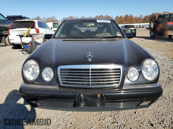 1997 Mercedes-Benz E-Class with VIN WDBJF72F0VA523161, listed as a Copart auction lot 77752804 with 143,495 mi miles and Salvage Title. Bid and sale history available at carsss.com. Image 5.