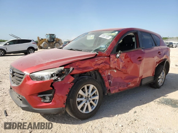 2016 Mazda CX-5 Touring with VIN JM3KE2CYXG0638247, listed as a Copart auction lot 53087305 with 0 mi miles and Salvage Title. Bid and sale history available at carsss.com. Image 1.