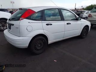 2005 Ford Focus S with VIN 3FAFP37N15R118435, listed as a IAAI auction lot 42671624 with 113,226 mi miles and . Bid and sale history available at DreamBid. Image 4.
