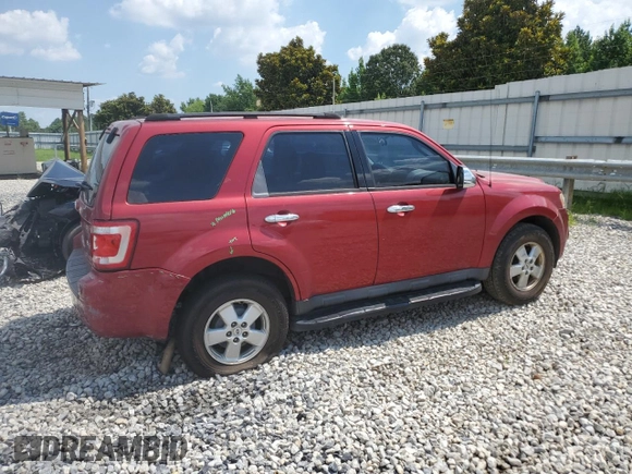 2009 Ford Escape XLS with VIN 1FMCU02739KA51016, listed as a Copart auction lot 63267285 with 152,559 mi miles and Salvage title. Bid and sale history available at DreamBid. Image 3.