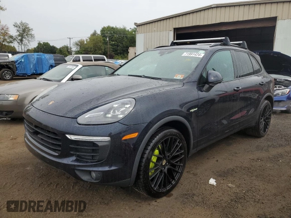 2016 Porsche Cayenne S E-Hybrid with VIN WP1AE2A26GLA60874, listed as a Copart auction lot 71991424 with 115,634 mi miles and Salvage title. Bid and sale history available at DreamBid. Image 1.