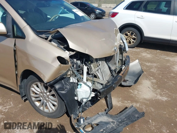 2012 Toyota Sienna XLE AAS with VIN 5TDYK3DC0CS202891, listed as a IAAI auction lot 41938594 with Not Provided miles and . Bid and sale history available at carsss.com. Image 18.