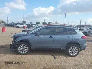 2022 Toyota Corolla Cross LE with VIN 7MUCAAAG0NV018245, listed as a IAAI auction lot 42039762 with 26,690 mi miles and . Bid and sale history available at DreamBid. Image 15.