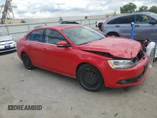 2012 Volkswagen Jetta TDI w/Premium & Nav with VIN 3VWLL7AJ6CM016111, listed as a Copart auction lot 58756965 with 152,444 mi miles and Salvage title. Bid and sale history available at DreamBid. Image 4.