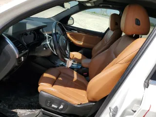 2019 BMW X3 sDrive30i with VIN 5UXTR7C57KLE97733, listed as a Copart auction lot 50323485 with 103,917 mi miles and Salvage Title. Bid and sale history available at carsss.com. Image 7.