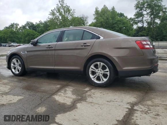 2015 Ford Taurus SEL z VIN 1FAHP2E84FG102075, wystawiony jako Copart lot #59740265 z przebiegiem 90 669 mil mil oraz Szkoda całkowita • Salvage title. Historia ofert i sprzedaży dostępna na DreamBid. Obrazek 2.