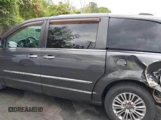 2014 Chrysler Town & Country Touring L with VIN 2C4RC1CG6ER195502, listed as a IAAI auction lot 42009629 with 126,157 mi miles and . Bid and sale history available at DreamBid. Image 14.
