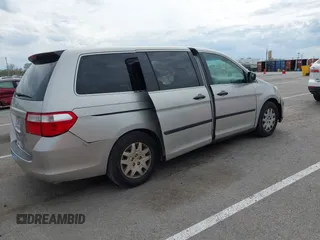2007 Honda Odyssey LX z VIN 5FNRL38297B073742, wystawiony jako IAAI lot #41919129 z przebiegiem 152 584 mil mil oraz . Historia ofert i sprzedaży dostępna na DreamBid. Obrazek 4.
