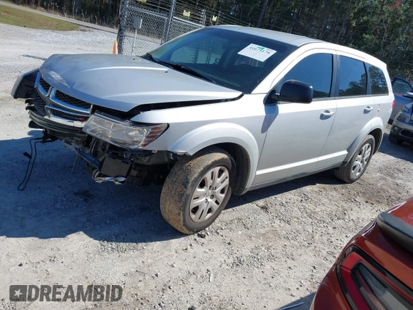 2014 Dodge Journey American Value Pkg with VIN 3C4PDCAB7ET259230, listed as a IAAI auction lot 41675179 with 151,386 mi miles. Bid and sale history available at carsss.com. Image 2.