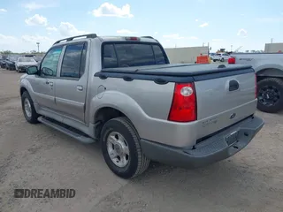 2003 Ford Explorer Sport Trac XLS z VIN 1FMZU67E43UA72537, wystawiony jako IAAI lot #42575959 z przebiegiem 142 692 mil mil oraz . Historia ofert i sprzedaży dostępna na DreamBid. Obrazek 3.