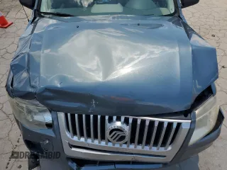 2010 Mercury Mariner with VIN 4M2CN9B70AKJ08597, listed as a Copart auction lot 63486595 with 113,207 mi miles and Salvage title. Bid and sale history available at DreamBid. Image 12.