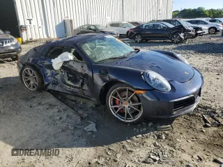 2018 Porsche 911 Carrera S with VIN WP0CB2A98JS147463, listed as a Copart auction lot 57485085 with Not provided miles and Salvage title. Bid and sale history available at DreamBid. Image 4.
