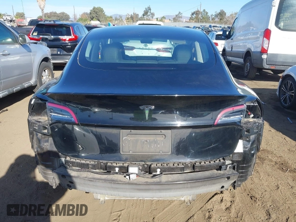 2022 Tesla Model 3 with VIN 5YJ3E1EA9NF295890, listed as a IAAI auction lot 41175917 with 42,230 mi miles and . Bid and sale history available at DreamBid. Image 17.