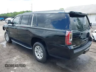 2019 GMC Yukon XL SLT z VIN 1GKS2GKC0KR394301, wystawiony jako IAAI lot #42255631 z przebiegiem 149 222 mil mil oraz . Historia ofert i sprzedaży dostępna na DreamBid. Obrazek 3.