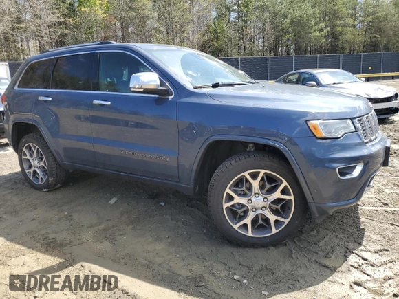 2020 Jeep Grand Cherokee Overland with VIN 1C4RJFCG7LC335839, listed as a Copart auction lot 52320505 with 86,684 mi miles and Salvage Title. Bid and sale history available at DreamBid. Image 4.