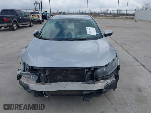 2020 Honda Civic LX z VIN 19XFC2F68LE001482, wystawiony jako IAAI lot #41484428 z przebiegiem 97 604 mil mil oraz . Historia ofert i sprzedaży dostępna na DreamBid. Obrazek 6.