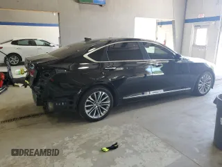 2017 Genesis G80 3.8L z VIN KMHGN4JE7HU206515, wystawiony jako Copart lot #57493675 z przebiegiem 115 108 mil mil oraz Szkoda całkowita • Salvage title. Historia ofert i sprzedaży dostępna na DreamBid. Obrazek 3.