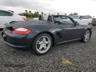 2005 Porsche Boxster z VIN WP0CA298X5U712515, wystawiony jako Copart lot #74030354 z przebiegiem Nie podano mil oraz Szkoda całkowita • Salvage title. Historia ofert i sprzedaży dostępna na DreamBid. Obrazek 3.