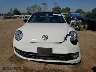 2012 Volkswagen Beetle 2.0T Turbo w/Sun/Sound with VIN 3VWV67AT5CM658403, listed as a Copart auction lot 71611614 with 10,878 mi miles and Salvage Title. Bid and sale history available at carsss.com. Image 5.