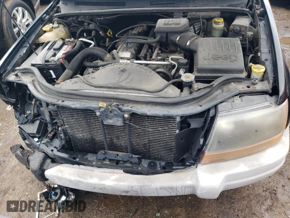2000 Jeep Grand Cherokee Laredo with VIN 1J4GW48S7YC100739, listed as a Copart auction lot 89072965 with 150,333 mi miles and Salvage title. Bid and sale history available at DreamBid. Image 11.