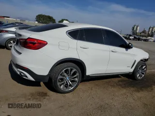 2015 BMW X6 sDrive35i with VIN 5UXKU0C5XF0F92120, listed as a Copart auction lot 58244044 with 157,311 mi miles and Salvage Title. Bid and sale history available at carsss.com. Image 3.