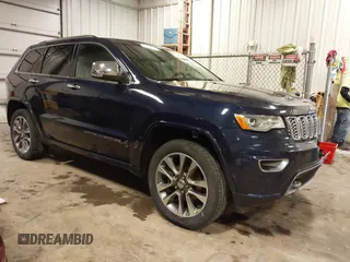 2017 Jeep Grand Cherokee Overland with VIN 1C4RJFCG3HC693897, listed as a IAAI auction lot 41636323 with 105,575 mi miles. Bid and sale history available at carsss.com. Image 1.
