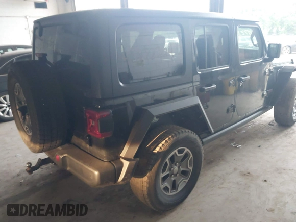 2021 Jeep Wrangler Unlimited Rubicon with VIN 1C4HJXFN2MW587168, listed as a IAAI auction lot 42472309 with 66,272 mi miles and . Bid and sale history available at DreamBid. Image 4.