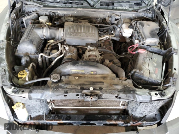 2005 Dodge Dakota SLT z VIN 1D7HW48N95S166589, wystawiony jako Copart lot #54868565 z przebiegiem 228 682 mil mil oraz Szkoda całkowita • Salvage title. Historia ofert i sprzedaży dostępna na DreamBid. Obrazek 11.