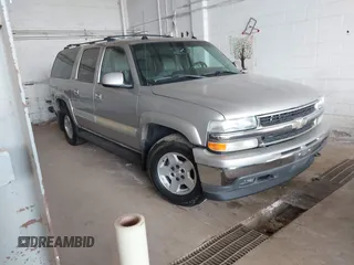2005 Chevrolet Suburban Z71 z VIN 3GNFK16Z25G201120, wystawiony jako IAAI lot #42402550 z przebiegiem 214 095 mil mil oraz . Historia ofert i sprzedaży dostępna na DreamBid. Obrazek 1.