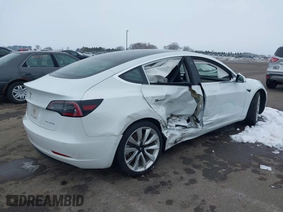 2018 Tesla Model 3 Long Range Battery with VIN 5YJ3E1EB2JF089006, listed as a IAAI auction lot 41186372 with Not Provided miles and . Bid and sale history available at DreamBid. Image 4.