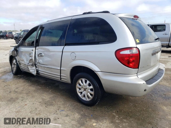 2001 Chrysler Town & Country LXi with VIN 2C8GP54L21R280196, listed as a Copart auction lot 85731344 with 127,056 mi miles and Non Repairable. Bid and sale history available at DreamBid. Image 2.