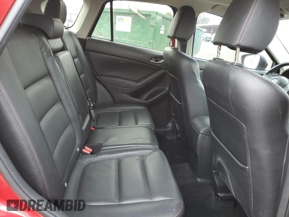 2014 Mazda CX-5 Grand Touring with VIN JM3KE4DY5E0360896, listed as a Copart auction lot 43978975 with 113,942 mi miles and Salvage Title. Bid and sale history available at carsss.com. Image 12.