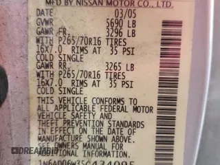 2005 Nissan Frontier LE with VIN 1N6AD06W35C434095, listed as a Copart auction lot 82559744 with 136,085 mi miles and Salvage title. Bid and sale history available at DreamBid. Image 12.