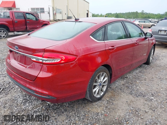 2017 Ford Fusion Hybrid SE with VIN 3FA6P0LU1HR238283, listed as a IAAI auction lot 42233496 with 123,452 mi miles and . Bid and sale history available at DreamBid. Image 4.