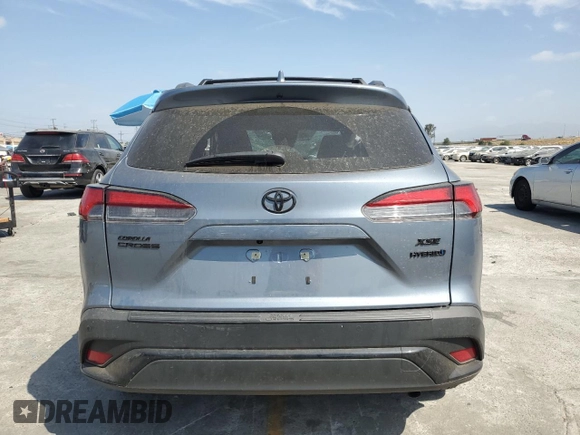 2024 Toyota Corolla Cross Hybrid S with VIN 7MUFBABG7RV043044, listed as a Copart auction lot 61828715 with 10,473 mi miles and Salvage title. Bid and sale history available at DreamBid. Image 6.