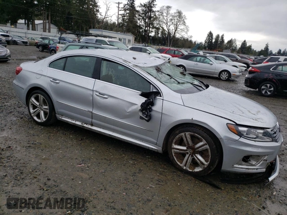 2014 Volkswagen CC Sport with VIN WVWAP7AN3EE527947, listed as a Copart auction lot 52452885 with 143,354 mi miles and Salvage Title. Bid and sale history available at carsss.com. Image 4.