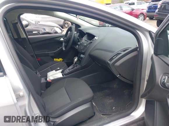 2017 Ford Focus SE with VIN 1FADP3F25HL335102, listed as a IAAI auction lot 42010697 with 77,389 mi miles. Bid and sale history available at carsss.com. Image 5.