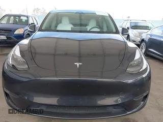 2024 Tesla Model Y Long Range z VIN 7SAYGDEE2RF069588, wystawiony jako IAAI lot #42024180 z przebiegiem 13 230 mil mil oraz . Historia ofert i sprzedaży dostępna na DreamBid. Obrazek 12.