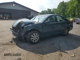 2004 Toyota Camry LE with VIN 4T1BE30K04U290232, listed as a Copart auction lot 59788975 with Not provided miles and Salvage title. Bid and sale history available at DreamBid. Image 1.