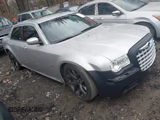 2006 Chrysler 300 C SRT8 with VIN 2C3LA73W96H370553, listed as a IAAI auction lot 41703760 with 187,696 mi miles. Bid and sale history available at carsss.com. Image 1.
