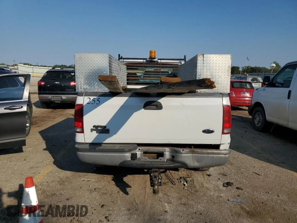 2000 Ford Super Duty F-250 XL with VIN 1FTNF20F7YED68355, listed as a Copart auction lot 75050664 with 107,434 mi miles and Salvage Title. Bid and sale history available at carsss.com. Image 6.